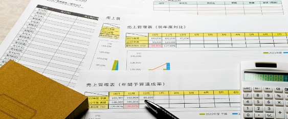 売上管理表と記載された書類の写真